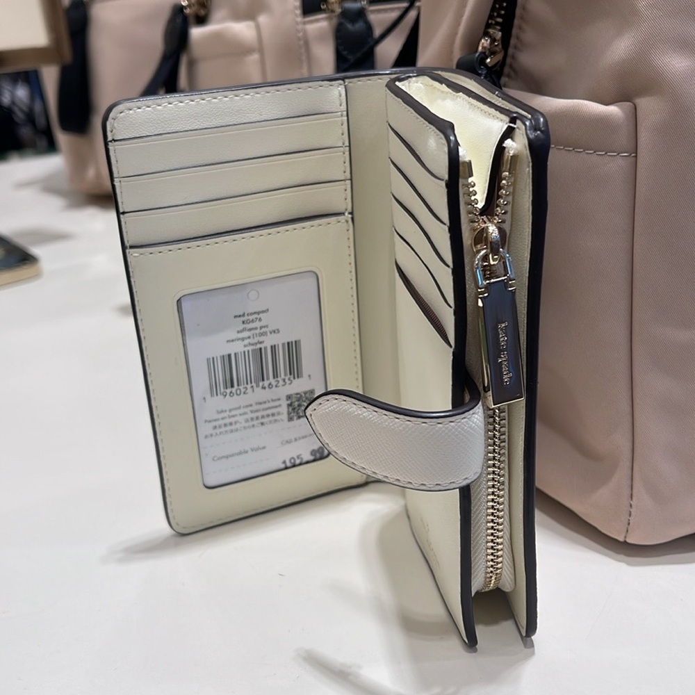 Kate Spade Schuyler Medium Compact Bifold Wallet
Meringue 
NWT - Picture 10 of 16